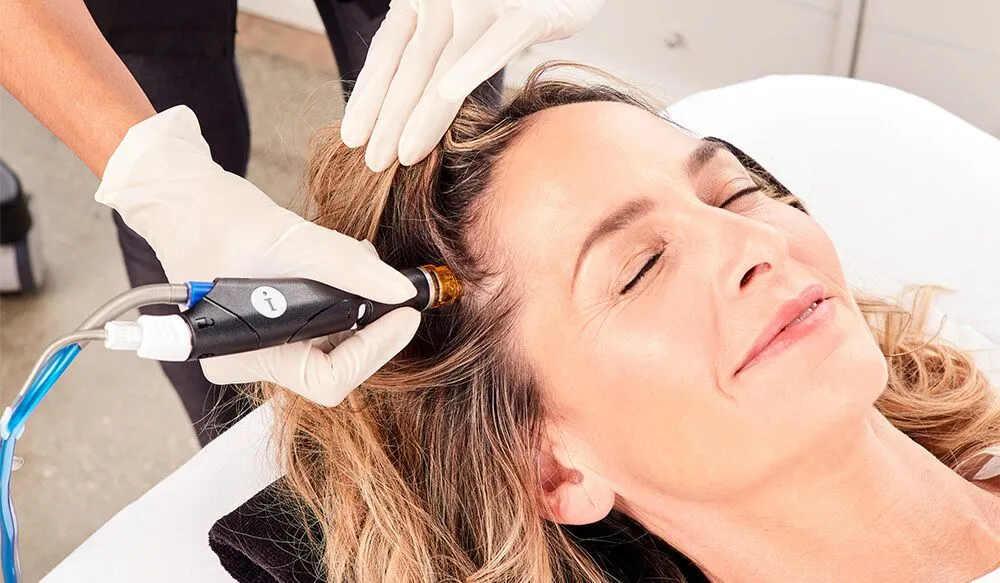 Nourishing hair treatment being applied